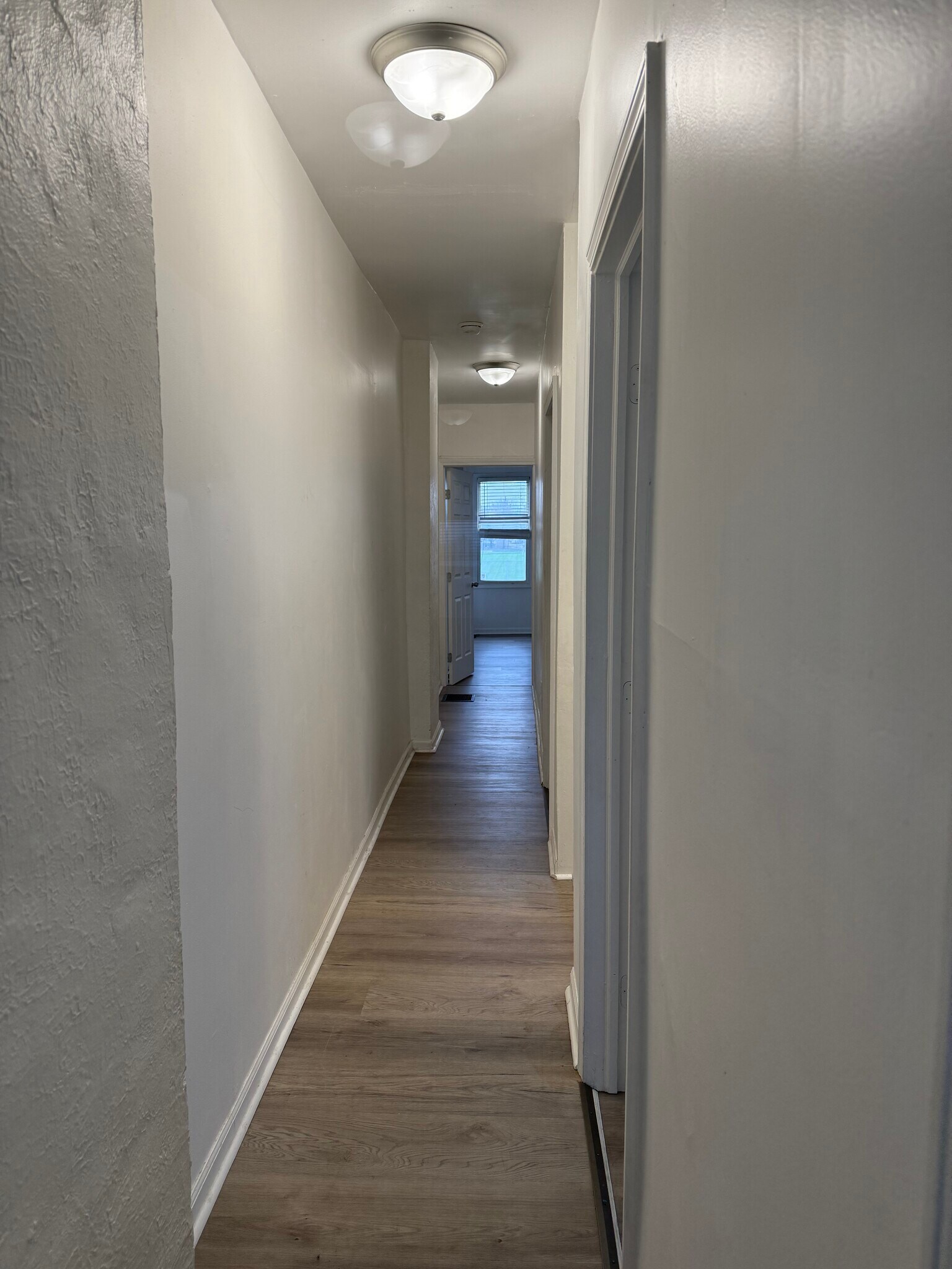 Upstair hallway to each bedroom and bath - 672 Stewart Ave