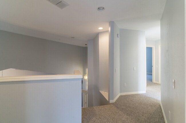 Building Photo - Beautiful 4/2 home Located on a tree lined street in the gate of country club community of the Hu...