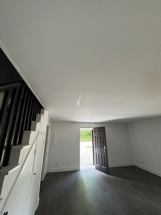 Building Photo - Spacious Two Story (2BR/1BA) Home with Large Fenced-In Yard