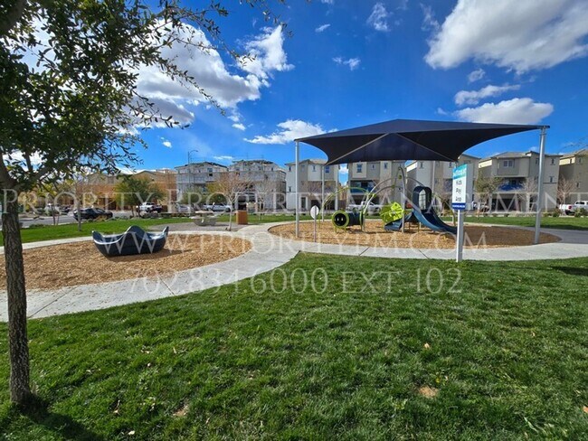 Building Photo - Gated~ 2 Bedroom Townhome w/2 Car Garage~MUST SEE!