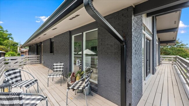 Building Photo - Renovated Mid-Century Modern Home in Belmont West with Finished Basement & Fenced Yard