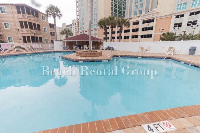 Building Photo - Furnished or Unfurnished Condo blocks from the beach