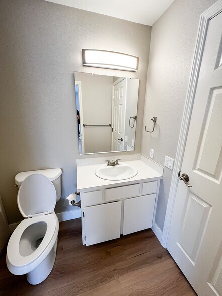 Bathroom 1 connected to bedroom 1 and shared with living area. - 6521 W Lucky Ln