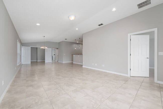 Building Photo - Deluxe Villa Lake view all Tile. 3 Bedrooms+2 Baths