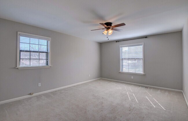 Building Photo - Welcome Home: Charming Brick Beauty with Covered Porch.