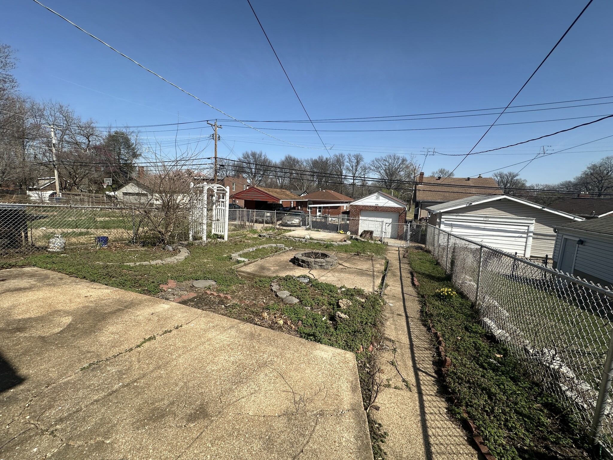 Big backyard with plenty of space for entertaining complete with a fireplace - 3737 French Ave