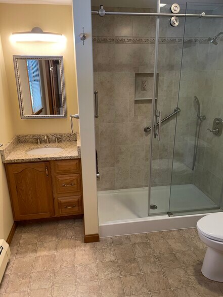 Walk-in shower. - 123 Riverlin St