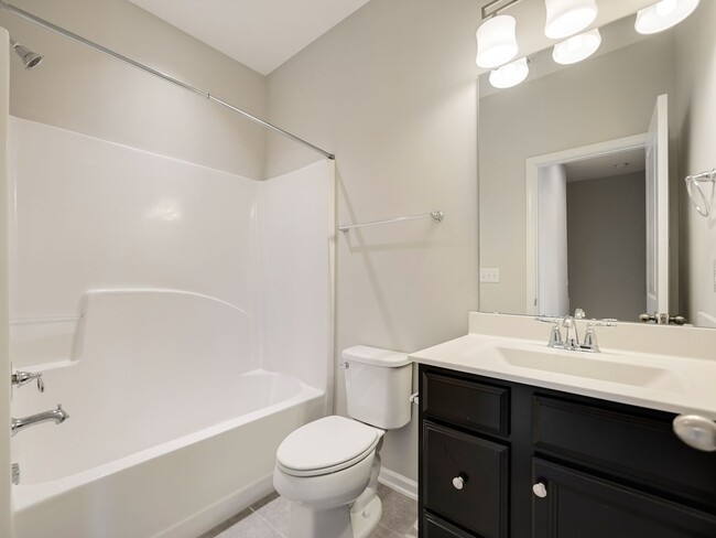 Building Photo - Contemporary, spacious 3-bedroom, 2.5-bath...