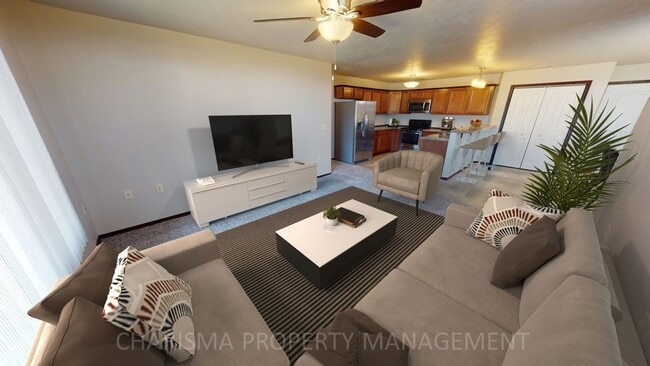 Building Photo - LOWER LEVEL 3 BEDROOM, 2 BATH TOWN HOME, INDIVIDUAL ENTRANCE, DOUBLE ATTACHED GARAGE, PET FRIENDLY