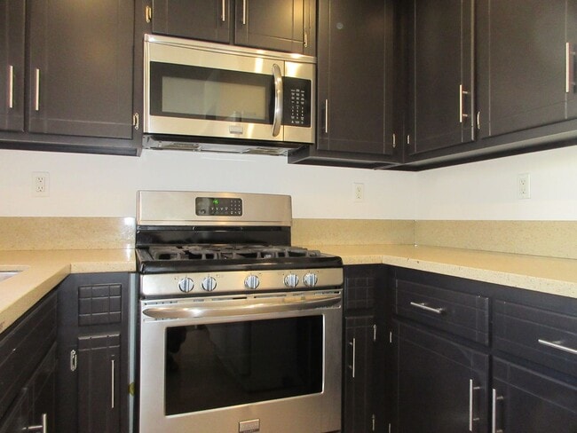 Building Photo - 2 bedroom Canoga Park condo on Eton Avenue...