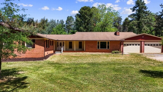 Building Photo - Large 4-Bed Brick Rancher with 2-Car Attached Garage!