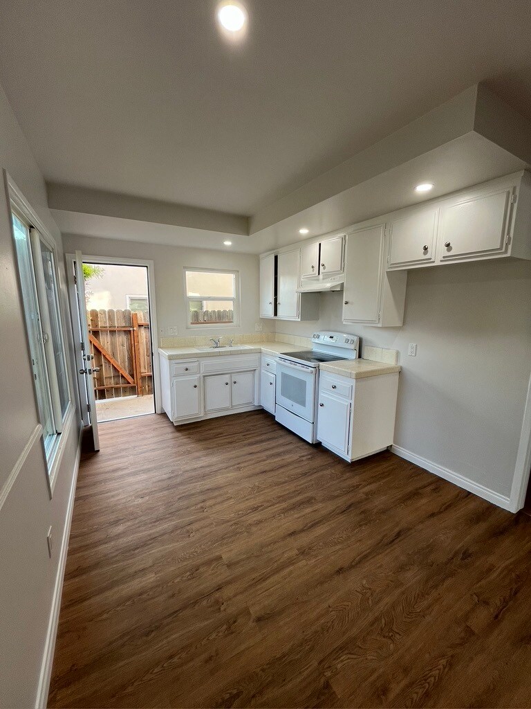 Unit A -Kitchen, Patio Door open - 2411 Harriman Ln