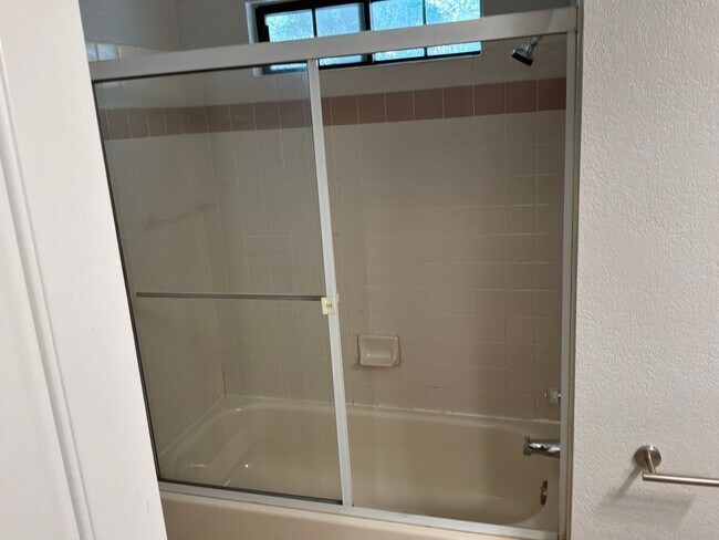 Building Photo - Condo 3 bedrooms 2 bathrooms 1 car garage gated subdivision.