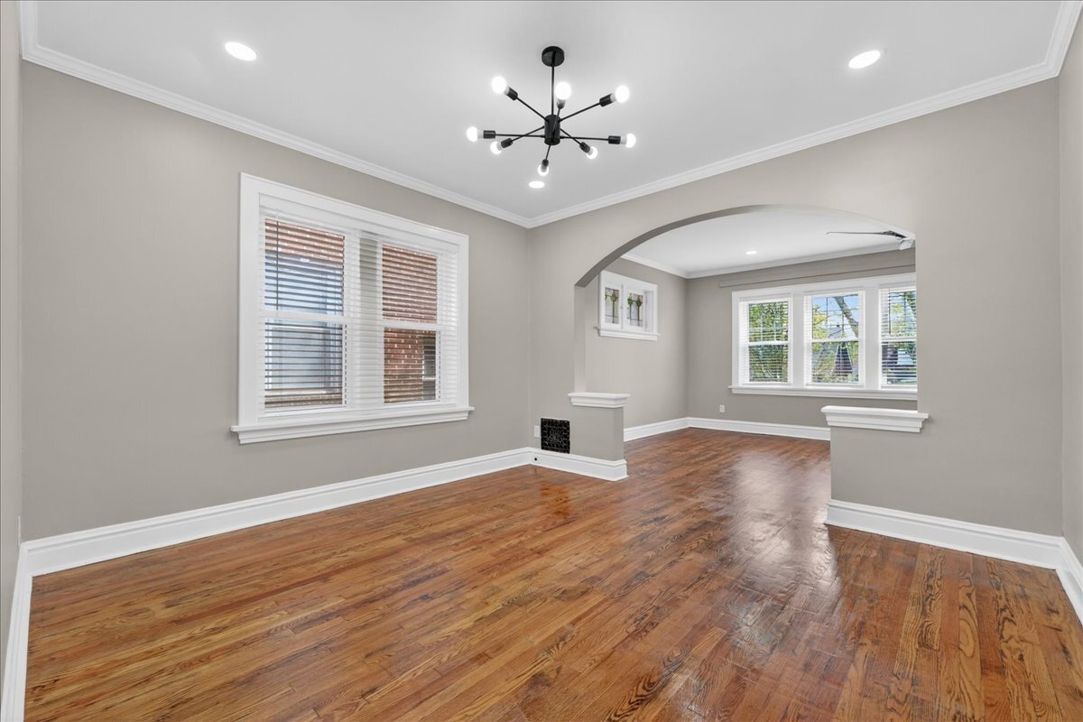 Dedicated dining space connected to living area and hallway—great for entertaining - 5185 Goethe Ave