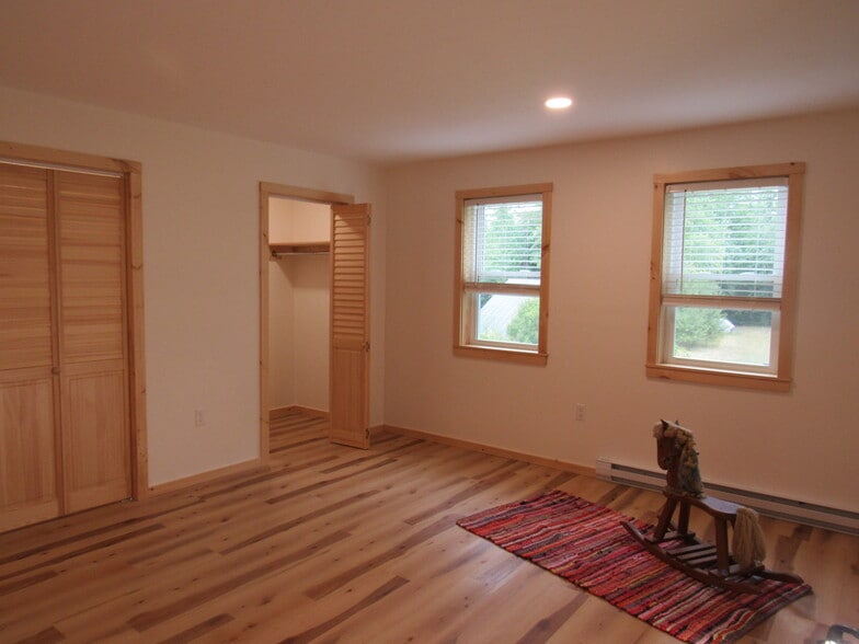 Bedroom facing your deck with 2 closets and woodland or meadow view - 57 River Rd