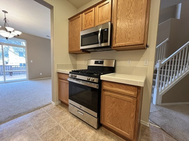 Building Photo - Inviting Two-Story 3BR Home Featuring Gas Range, Walk-In Closet, and Built-In Deck Seating