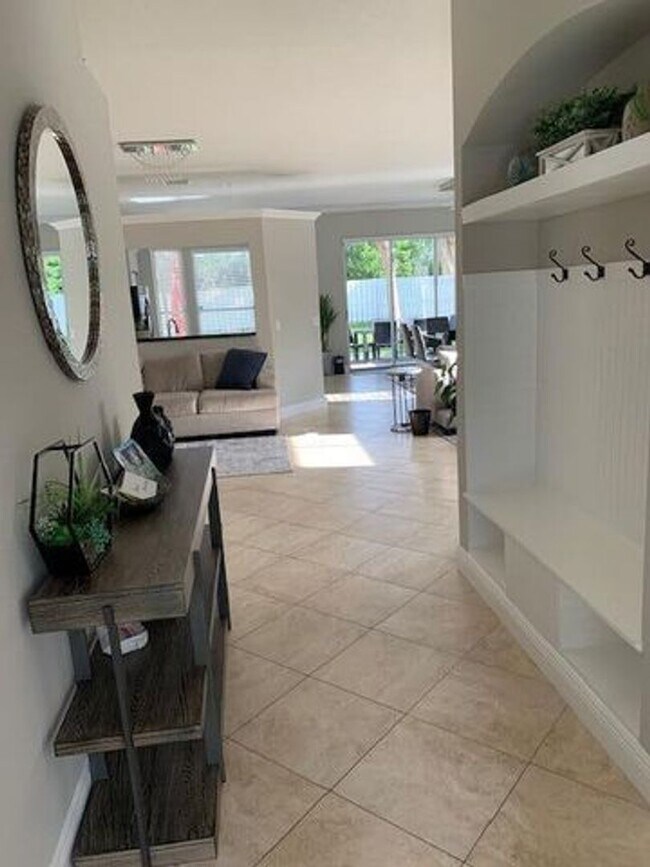 Building Photo - 7891 Manor Forest Blvd