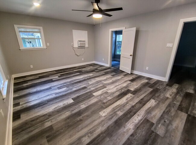 Building Photo - Fully Renovated 3-Bedroom Rental – New Appliances, Huge Yard, Garage, & Individual Room A/C!