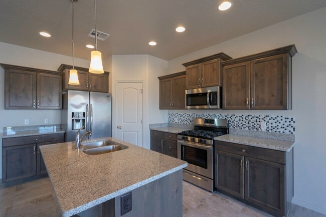 Building Photo - 4 bedroom 2 Bath Home in Desert Edge Cove - RV parking!