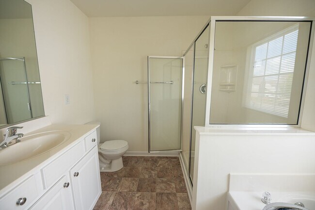 Building Photo - Spacious beautiful 4 bedroom 2.5 bath home  In Greensboro with an office/upstairs loft/ sunroom/ ...