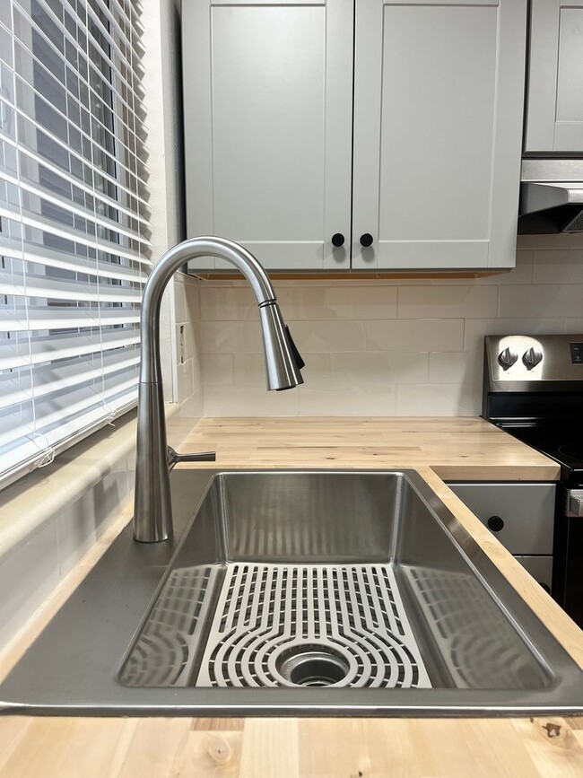 Building Photo - Fresh, Contemporary Remodel with Solar, Walk-In Closets & Great Outdoor Space