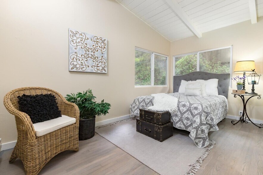 There's room for a sitting area or desk in the larger bedroom. - 665 Cathedral Dr