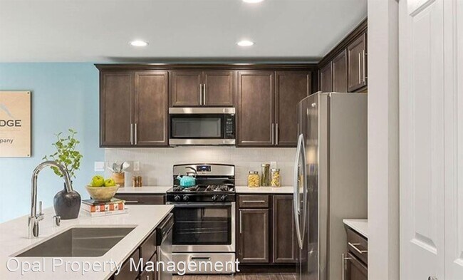 Building Photo - 4 br, 2.5 bath House - 8652 54th St NE