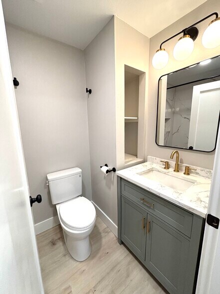 Fully remodeled bathroom, bright modern lighting and vanity - 2026 Lombard Ave