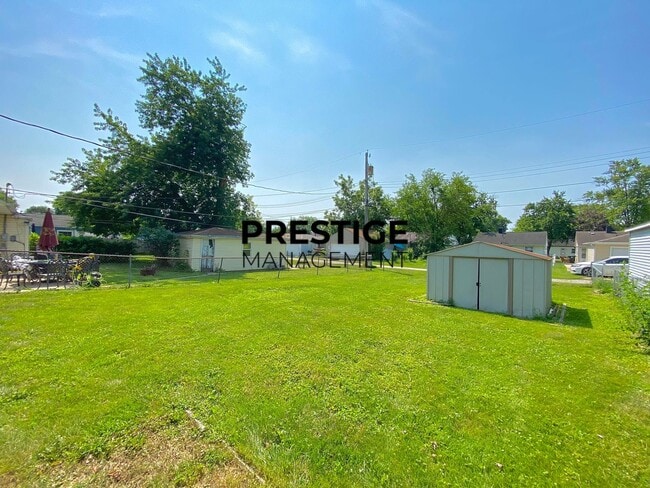 Building Photo - 1229 W 44th Pl