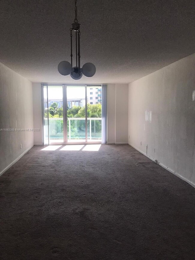 Building Photo - 19380 Collins Ave
