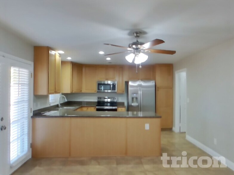 Building Photo - 9026 N 64th Dr