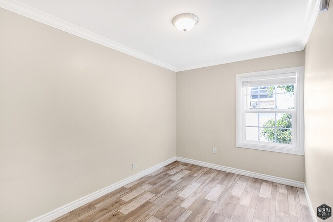 Building Photo - 8613 1/4 W. Olympic Blvd-