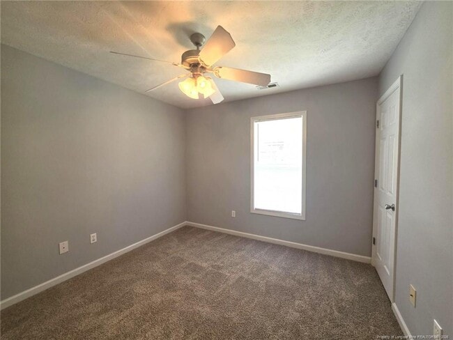 Building Photo - 6312 Firefly St