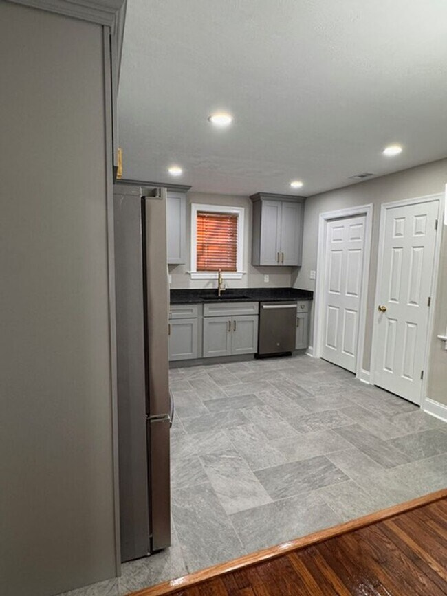 Building Photo - Fully renovated from the crawl space to the newly installed roof.