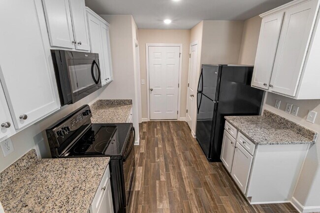 Building Photo - Modern Comfort Meets Outdoor Adventure – Stunning 1-Story Home Near Downtown Greensboro!