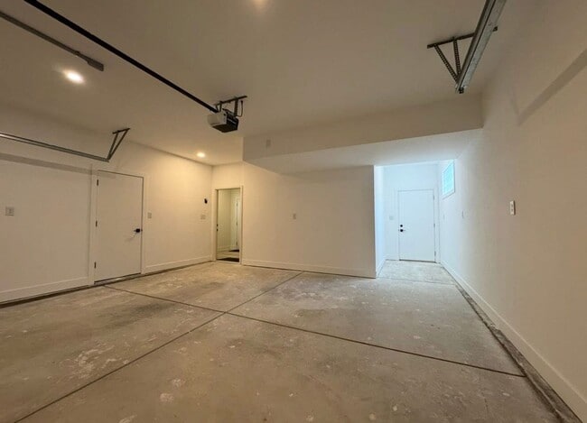 Building Photo - Vaulted Ceilings & Hardwood Floors in This Charming Indianapolis L