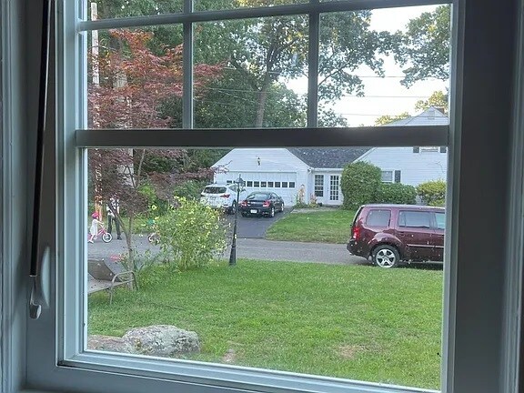Side yard - view from kitchen window - 58 Oakwood Dr