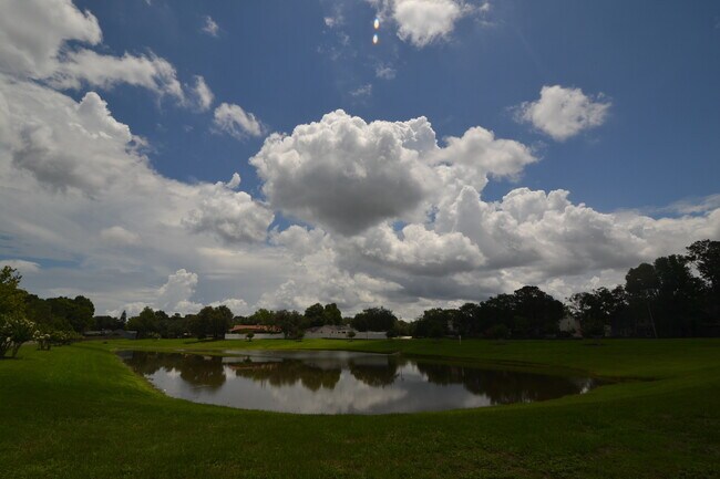 Building Photo - Beautiful 2/2.5 Winter Springs Townhome ~ Newer Paint & Flooring ~ End Unit with Pond View!