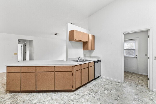 Building Photo - Annual ** 4 Bed / 3 Bath Single Family Home -- $1,950/month