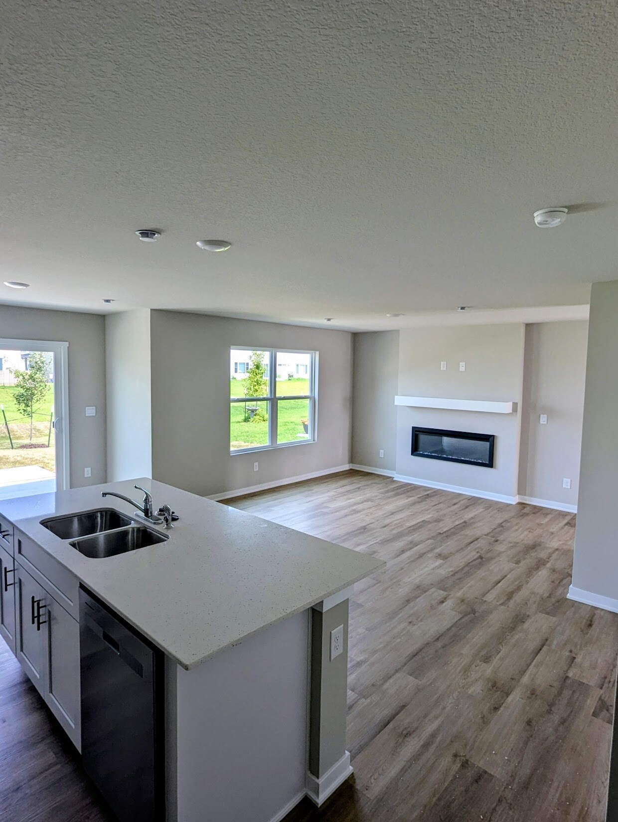 Kitchen Island and Living Room Fireplace - 4306 NE 13th St