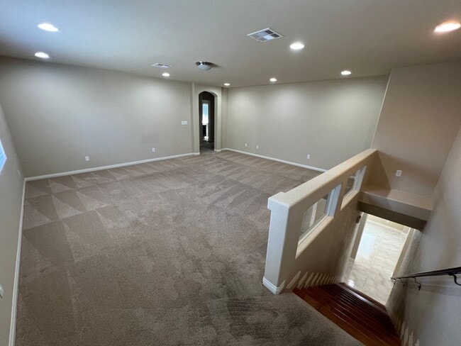 Building Photo - A Fantastic 4 Bedroom Home with the primary Downstairs, in Silverado Ranch