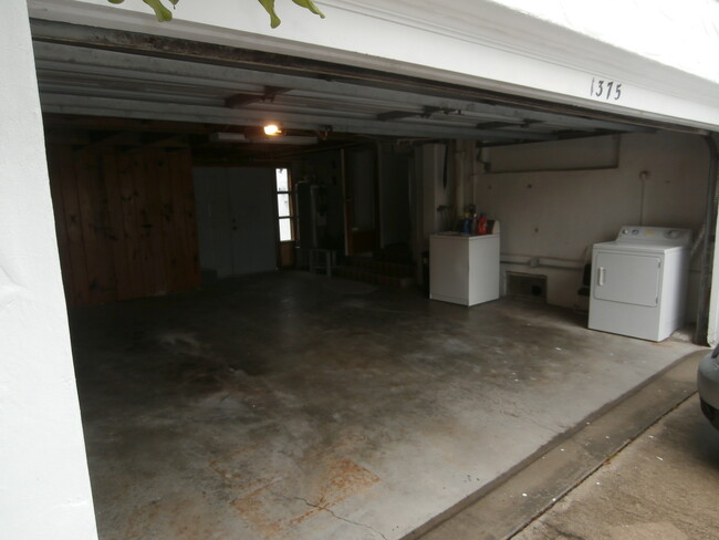 oversized 2-car attached garage with a storage room. - 1375 Alcazar Ave