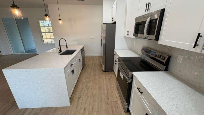 Building Photo - 2380 W Gardenia Dr