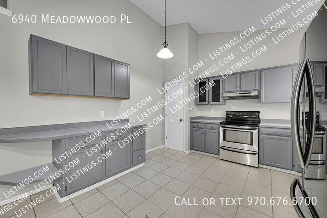 Building Photo - 6940 Meadowwood Pl