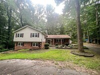 Building Photo - Remarkable Home With Spacious Deck And Det...