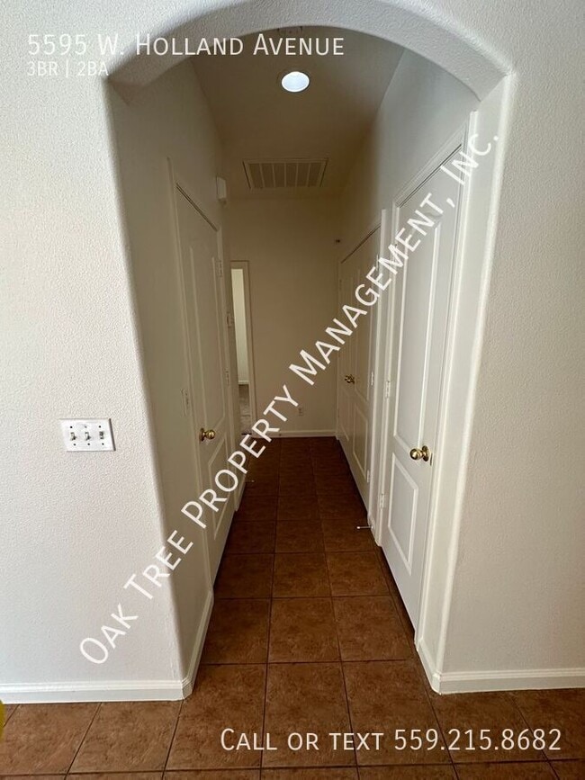 Building Photo - 5595 W Holland Ave