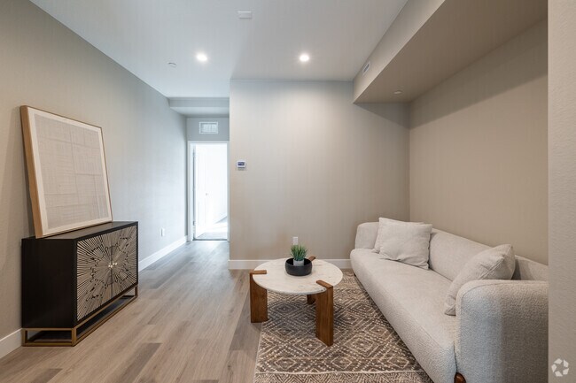 2BR, 2.5BA - 1,542SF - Second floor living room - South Broadway Station Townhomes