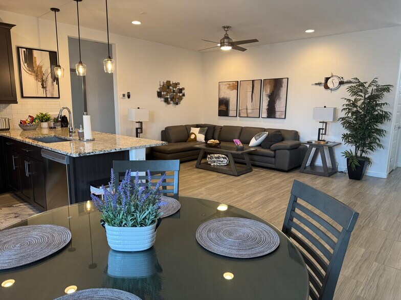 Full view of living room and kitchen area - 8957 W Palo Verde Dr