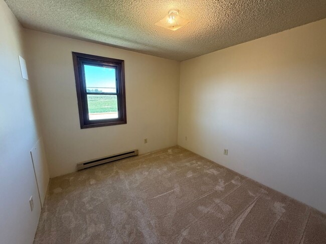 Building Photo - Two Bedroom, One and half bath townhome close to Regional West Medical Center.
