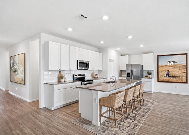 Building Photo - 4 Bedroom Home with Open Layout and Refrigerator Included